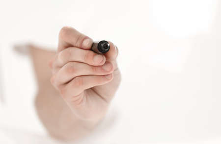 marker is in the mans hand .の写真素材