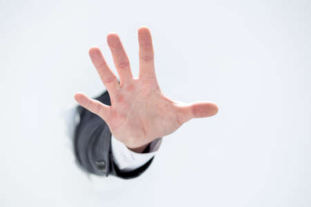 hand of a businessman showing stop gestureの写真素材