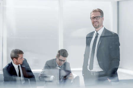 responsible businessman standing in the office