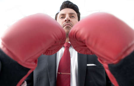 close up.serious businessman in Boxing glovesの写真素材