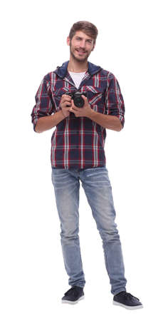 full-length .a handsome young man with a camera.