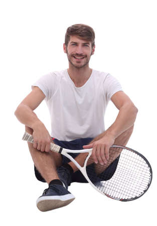 sporty young man with tennis racket.の写真素材