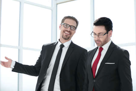 Two employees discuss the results of their workの写真素材