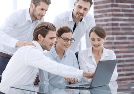 business team discussing online newsの写真素材