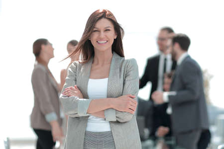 smiling business woman on the background of the officeの写真素材