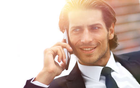 business man talking on smart phone.