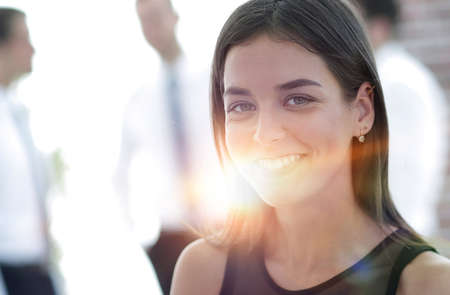 portrait of young business woman on blurred background.の写真素材