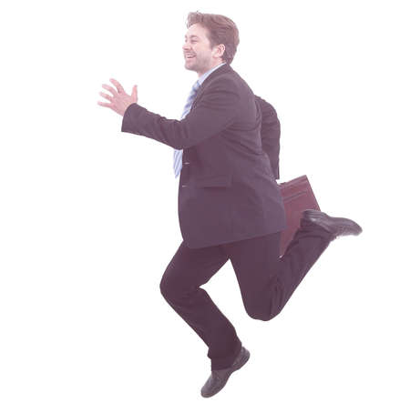 in full growth. businessman with briefcase runningの写真素材