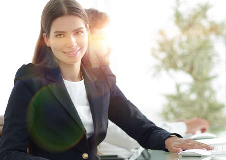 young business woman sitting at Deskの写真素材