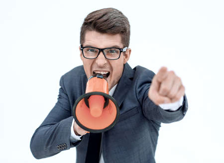 close up. angry businessman with a megaphoneの写真素材
