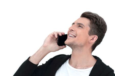 handsome guy looking at the smartphone screen