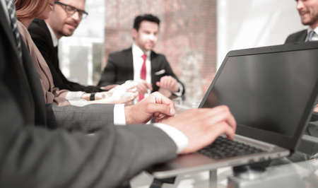 Young group of people discussing business plans.の写真素材