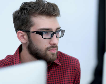 Manager analyzes financial charts sittingの写真素材