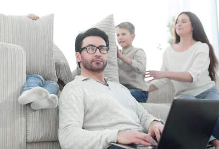 modern family in the living room in the evening.の写真素材