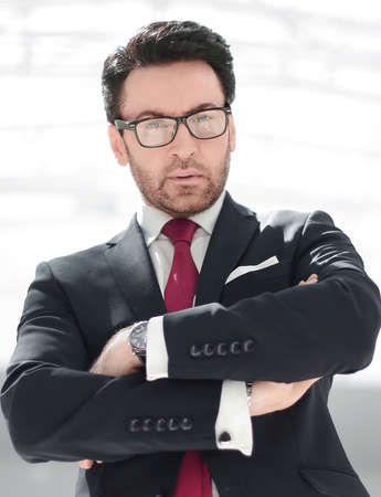 portrait of a confident businessman with glasses