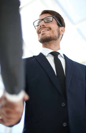 close up of business handshaking from belowの写真素材