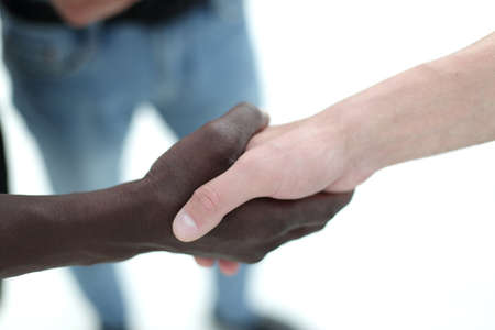 close up.strong handshake of business people