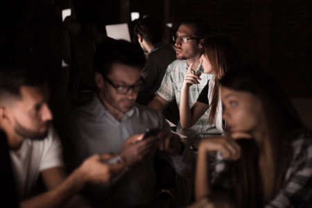 business team uses gadgets to get the information they need