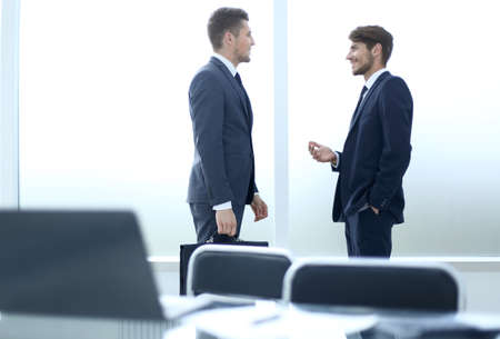 businessmen discuss an office dealの写真素材