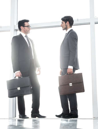 business background.business people talk standing in the officeの写真素材