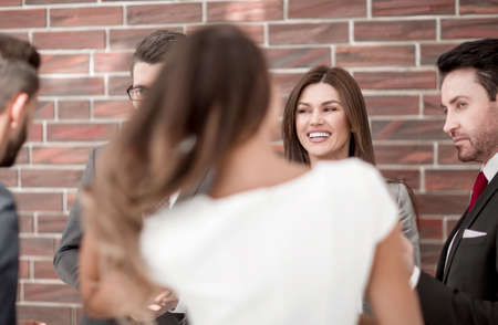 close up.a group of employees talking in the officeの写真素材