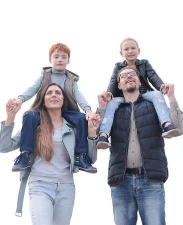 young family with two children on a walkの写真素材