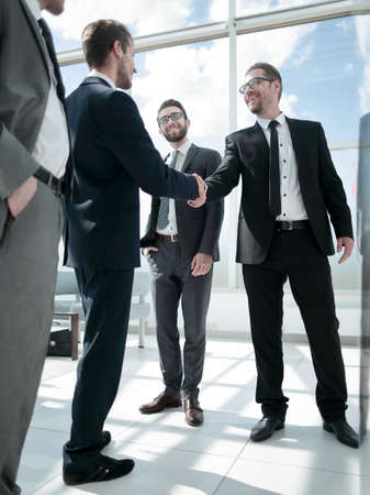 welcome and handshake of business peopleの写真素材