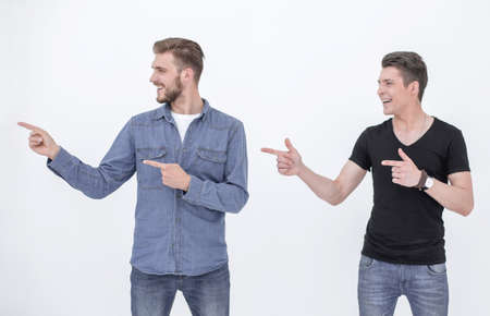 two friends stand and show on copy space