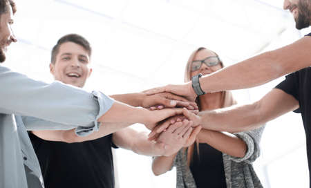 Business people joining hands. Team work concept.の写真素材