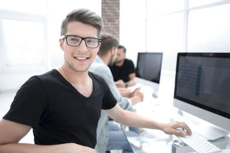 Shot of diverse business team discussing work in office