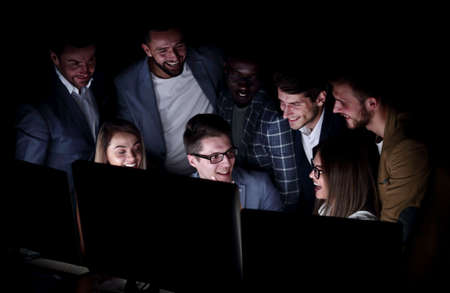 close up.a group of employees discussing business newsの写真素材