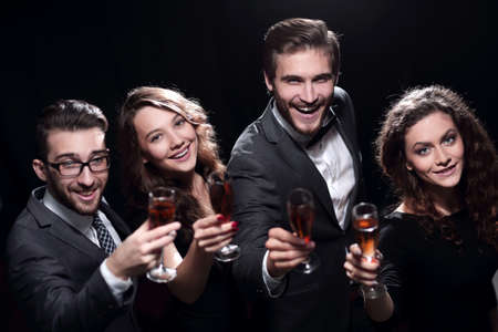 closeup.best friends with a glass of wine.の写真素材