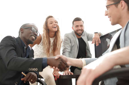 handshake business colleagues in the office.