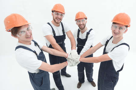 team of builders showing their solidarityの写真素材