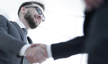 Successful business people handshaking after good deal.の写真素材
