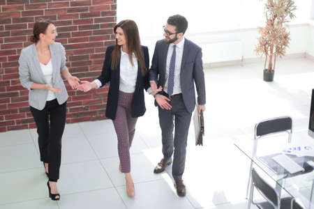 in full growth.a group of business people standing in the office