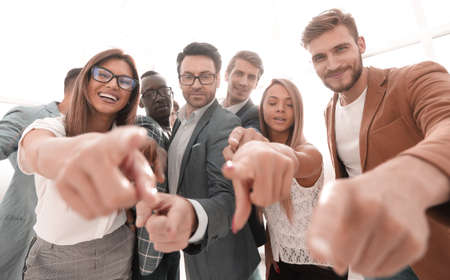 group of successful business people pointing at youの写真素材