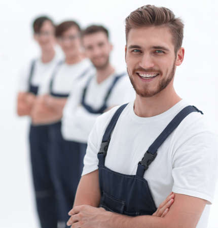 Cheerful team of responsible movers isolated on white backgroundの写真素材
