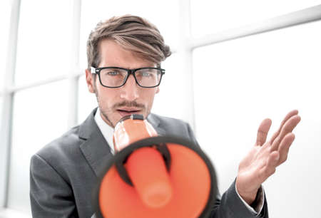 businessman screaming megaphoneの写真素材