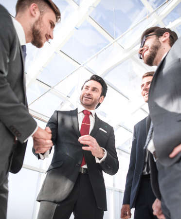 handshake business partners standing in the officeの写真素材