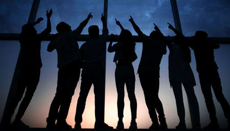 in full growth. business team pointing upの写真素材