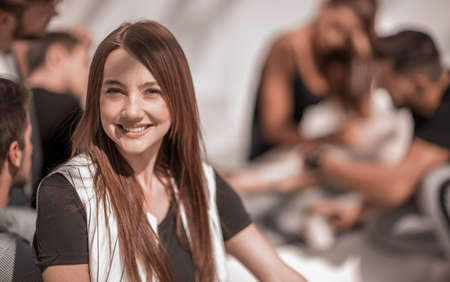 young employee on the background of the creative officeの写真素材