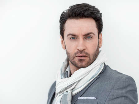 close up.portrait of stylish man in blue jacket with scarf