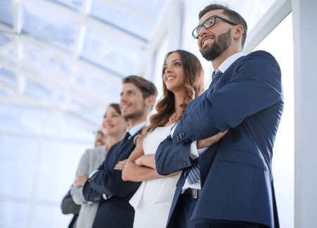 successful businessman on the background of business teamの写真素材