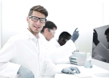 head of the research center sitting at his Desk