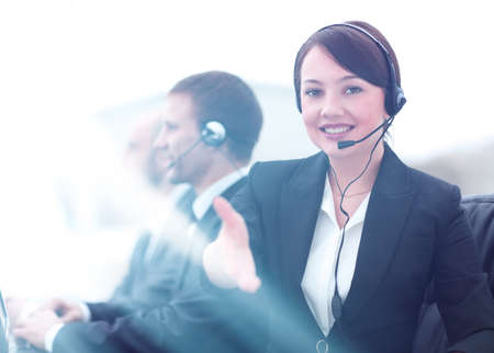 Manager of call center reaches out to shake hands.