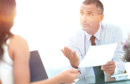 closeup. Manager discusses with the client the terms of the contractの写真素材
