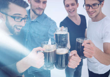 Funny young people with a beer mug full of beer