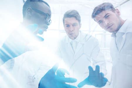 close up.a group of microbiologists discussing new ideasの写真素材
