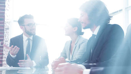 Manager holds a meeting with the business team